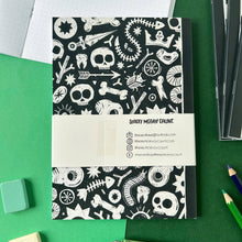 Skull and Bones Dot Grid Notebook 💀